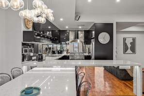 Executive Apartment | Private kitchen | Full-sized fridge, microwave, oven, stovetop - StayCentral - Moonee Ponds Penthouse (Moonee Ponds)