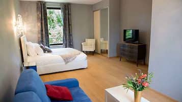 Habitación doble familiar, vista al jardín | Ropa de cama de alta calidad y camas Select Comfort