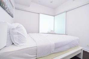 1 habitación, tabla de planchar con plancha, cuna de viaje y wifi