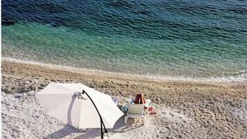 Beach nearby, sun loungers