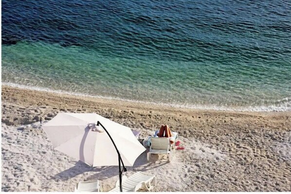 Beach nearby, sun-loungers