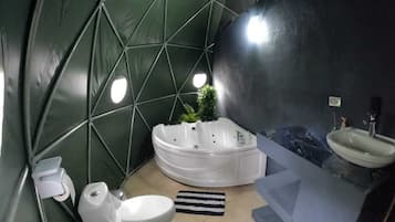 Bathtub, jetted bath, bathrobes, towels