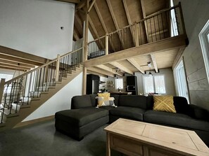 Smart TV, fireplace, table football, books