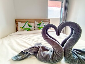 Deluxe Suite, Terrace | Desk, laptop workspace, free WiFi, bed sheets