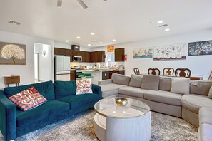 Smart TV, fireplace, books, computer monitors