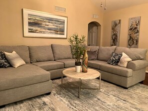 Smart TV, fireplace, books, stereo