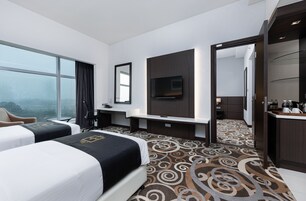 Family Suite | In-room safe, desk, blackout drapes, iron/ironing board