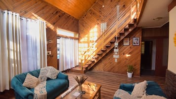 Premium Cottage | Living area | 32-inch LED TV with cable channels, TV