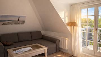 Smart-tv, böcker och en stereo