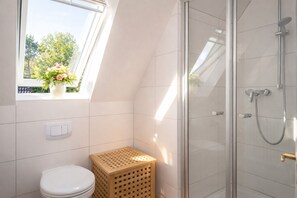 Shower, hair dryer, towels, soap