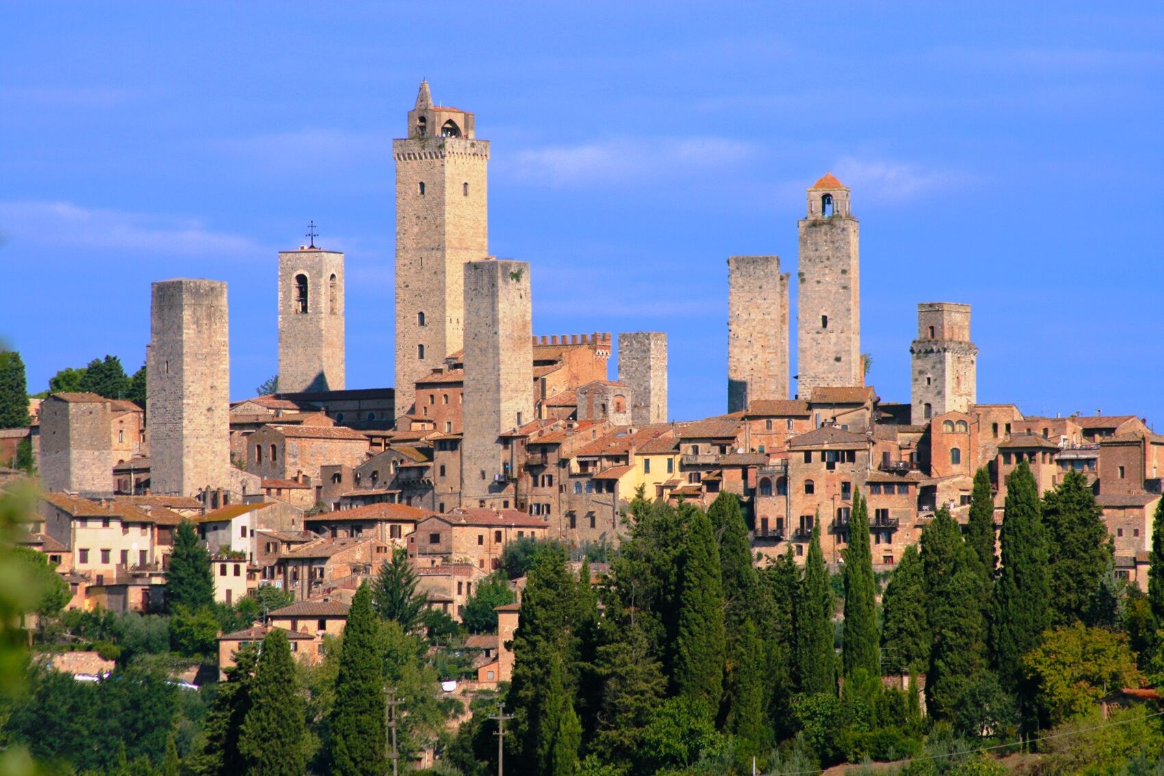 A historic town with medieval towers and buildings.