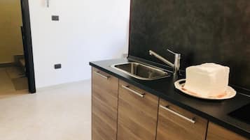Frigorífic, microones, forn i placa de cuina