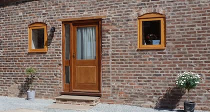 Barn conversion on small working farm