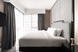 Suite, 1 slaapkamer | Donsdekens, pillowtop-bedden, individueel gedecoreerd