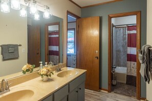 Bathtub, hair dryer, towels