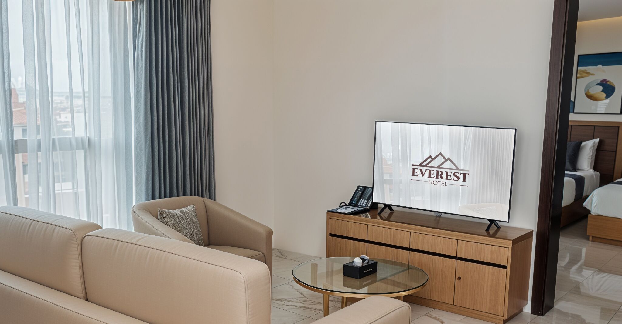 A hotel room with a sofa, a glass coffee table, a television, and a wooden cabinet.