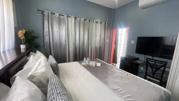 Habitació individual Deluxe | Cortines opaques, planxa i posts de planxar i wifi gratuïta