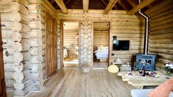 Royal Bungalow Pool View | Living area | 32-inch LCD TV with satellite channels, TV