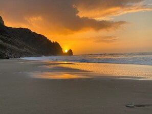 On the beach, sun loungers