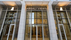 A building facade with the name "ABDALI VIEWS" prominently displayed. - Abdali Views Apartments (Amman)