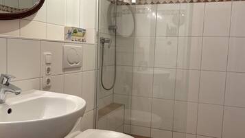 Douche, sĂšche-cheveux