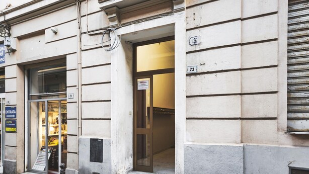 A building with a ground-floor entrance, a visible door, and a number '23' on the wall. - Sanremo Central Nest by Wonderful Italy (Sanremo)