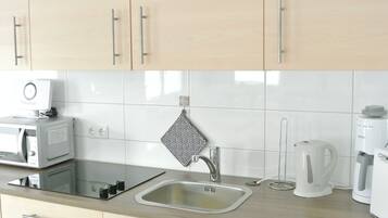 KylskÄp, mikrovÄgsugn, spishÀll och diskmaskin