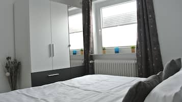 2 dormitorios, cuna de viaje, wifi gratis y ropa de cama