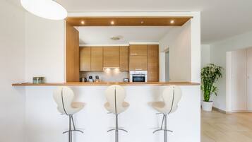 Apartment | Private kitchen | Full-sized fridge, oven, stovetop, dishwasher