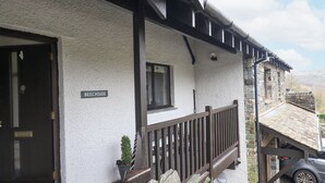 A building with a sign reading "BEECHSIDE" on the exterior wall. - Beechside (Ambleside)