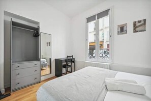 1 habitación, tabla de planchar con plancha, wifi y ropa de cama 