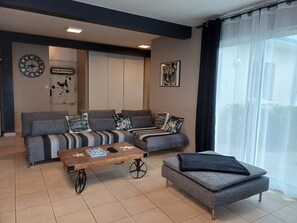 Smart TV, fireplace, table football, books