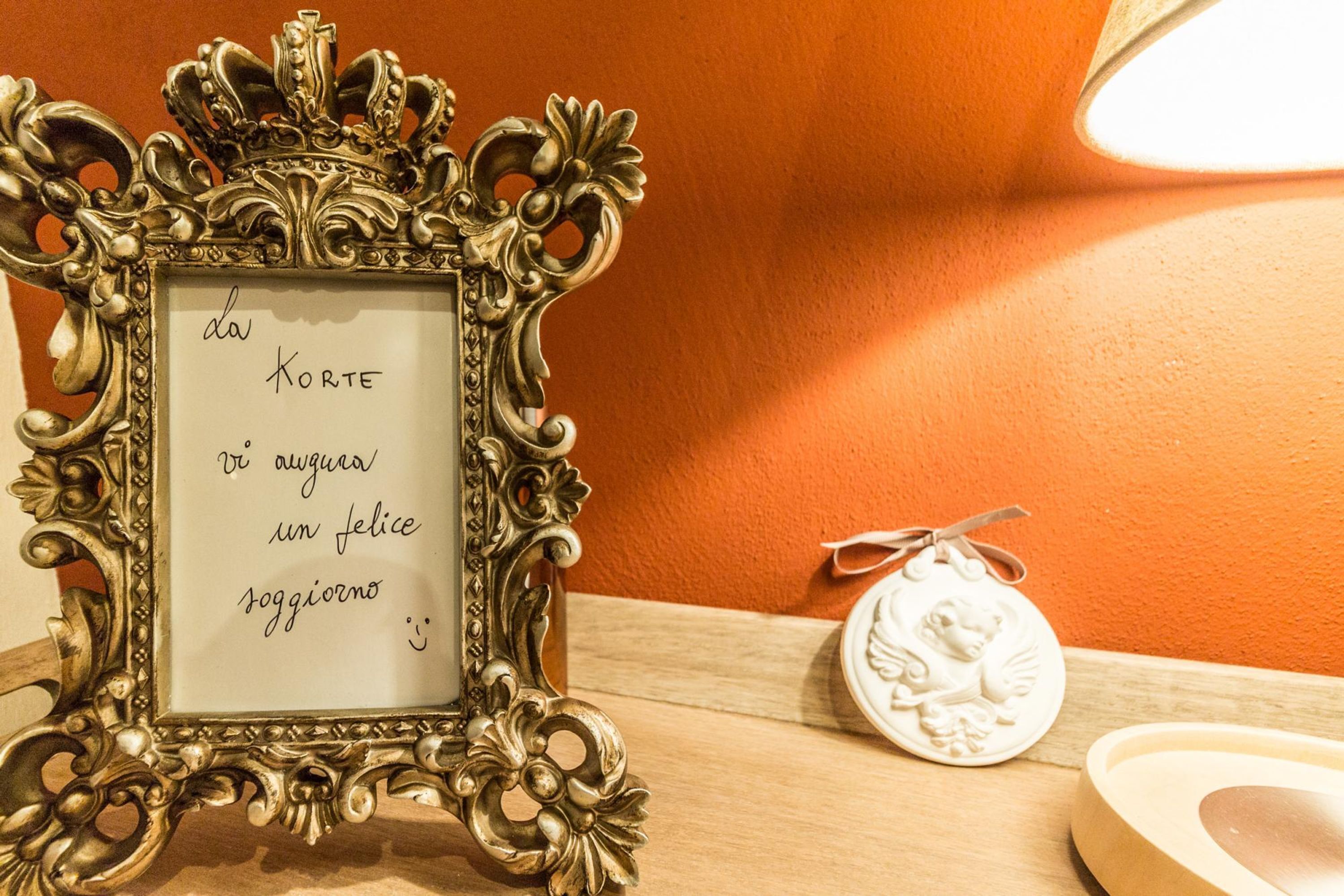 A decorative frame with a handwritten note.