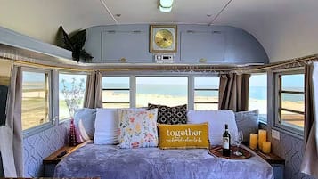 1 bedroom, desk, iron/ironing board, travel crib