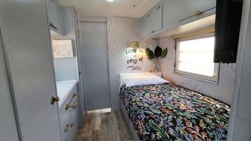 1 bedroom, desk, iron/ironing board, travel crib