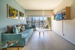 Apartment | Living area | 40-inch Smart TV with digital channels