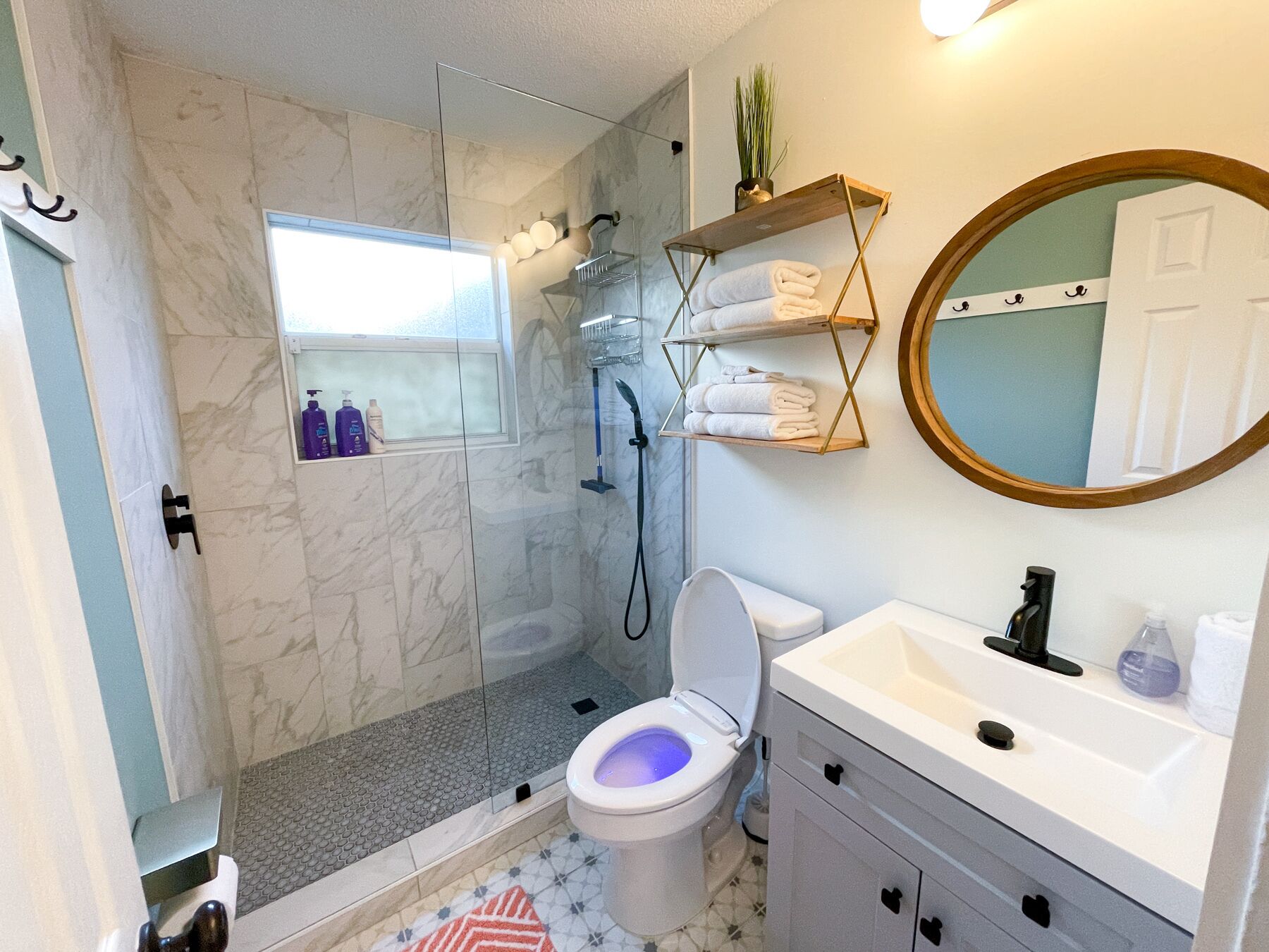 Shower, hair dryer, towels, soap