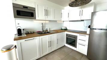 Réfrigérateur, micro-ondes, four, lave-vaisselle