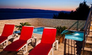 Outdoor pool, a heated pool - Modern vacation apartment with pool and sea view (Pisak)