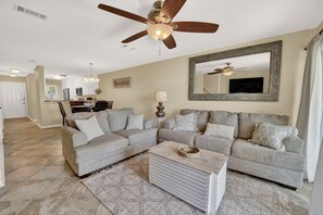 Villa | Living area | 32-inch Smart TV with cable channels