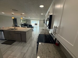 Fridge, microwave, oven, stovetop - 5-Bedroom Water Front Vacation Home - Tropical Paradise with Breathtaking Views! (Port Richey)