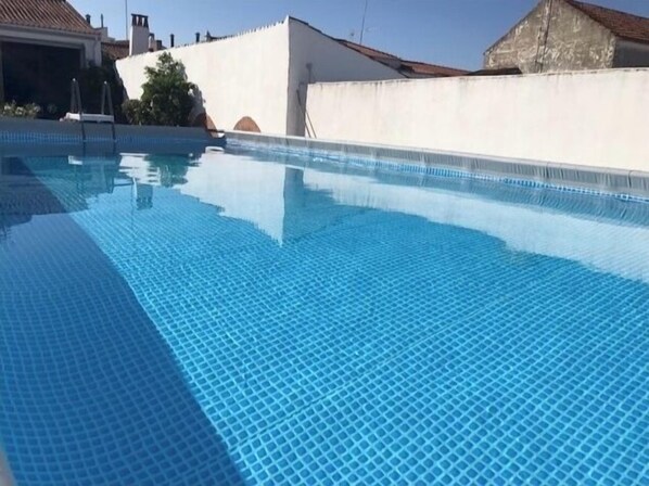 Seasonal outdoor pool, pool umbrellas, sun loungers