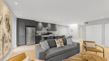 Executive Apartment | Living area | 80-inch Smart TV with digital channels, TV, Netflix