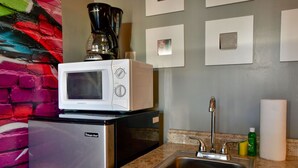 A compact kitchenette with a microwave, a coffee maker, a refrigerator, and a sink. - ✨Bright amazing studio in Wynwood (Miami)