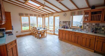 Rural retreat with 3 double bedrooms. Access via 1 mile of bumpy farm track.