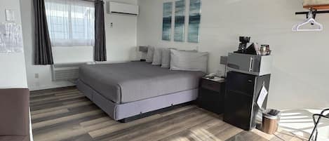 Chambre Deluxe, 1 trĂšs grand lit, non-fumeur, foyer | Ameublement unique, espace de travail pour ordinateurs portables