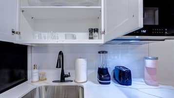 Fridge, microwave, coffee/tea maker, toaster