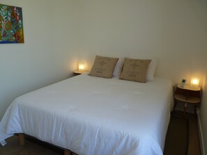 1 bedroom, desk, iron/ironing board, travel crib