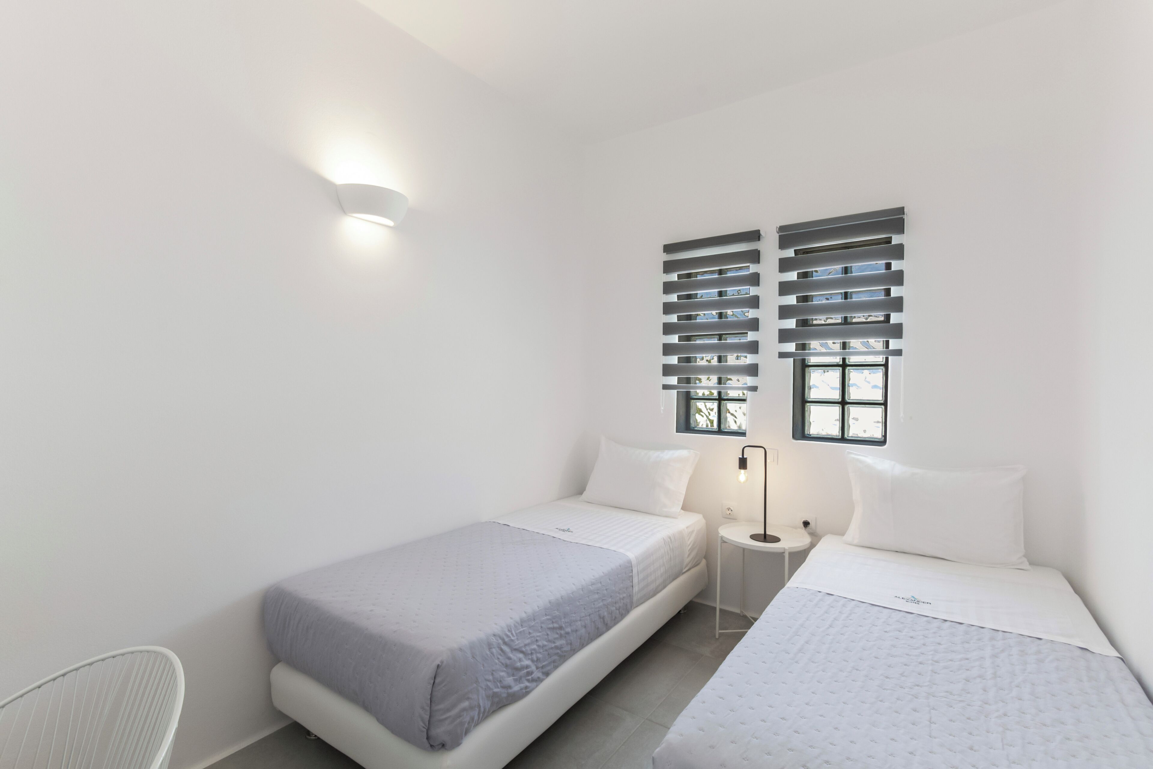 Premium bedding, memory-foam beds, in-room safe, laptop workspace