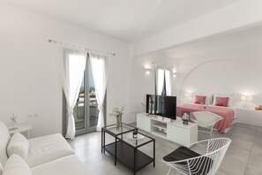 Exclusive Suite | Living area | 43-inch Smart TV with satellite channels, TV - Alexander Suites (Paros)